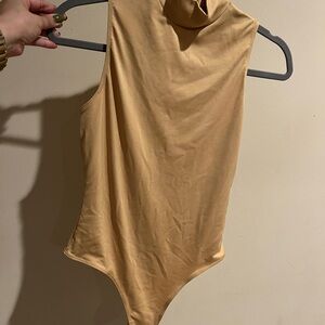 Victoria’s Secret Tan/Gold bodysuit